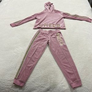 Cheer jumpsuit - soft light pink with gold accents, lightly worn